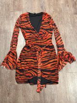 PrettyLittleThing Orange/Black Animal Print Wrap Mini Dress Photo 0