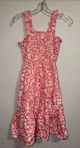 pink and white floral smocked sundress from the boutique brand Versona Photo 0