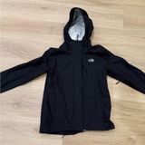 Black north face rain jacket Photo 0