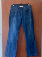 Levi, Size 4 Medium Blue Flare Wide Leg Jeans with Classic Denim Look Photo 0