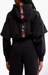 FP Movement Snow Flow Hoodie in Black Combo NWT. Gorgeous cropped hoodie. Two-layer sleeves. Stretchy oversize boxy fit. 20.5” bust 17.5” long Photo 0