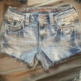 Rockin rival, distressed, and embroidered jeans Photo 0