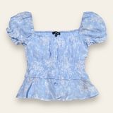 NWT Francesca’s Pastel Blue Floral Peplum Top Photo 0