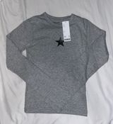 tee Photo 0