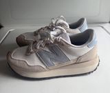 Nike New Balance Photo 0