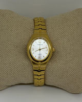 Vintage Carriage by Timex Gold Tone Oval Quartz Watch Stretch Band size 4” Photo 0