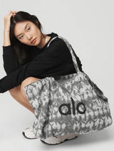 Alo Yoga Iconic Shopper Tote in a gray tie-dye cotton canvas material Photo 0