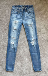 AE Low Rise Ripped Skinny Jeans Photo 0