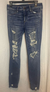 American Eagle Outfitters Ripped Blue Skinny Jeans Photo 0