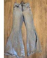 Free People CRVY High-Rise Lace-Up Back Flare Jeans Light Wash Denim Photo 0