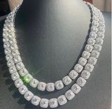 Make a statement with this iced-out cushion-cut tennis necklace, featuring rows of brilliant, sparkling stones set in a classic tennis-chain design. The cushion-shaped stones give it a bold, clean look while creating plenty of shine from every angle. ✨ Features: * 💎 Cushion-cut stone design * ❄️ Fully iced-out, high-shine appearance * 🔗 Classic tennis necklace style * ✨ Eye-catching sparkle in natural and flash lighting * 👑 Bold luxury-inspired look * 🖤 Great for everyday wear, going out, parties, photoshoots, or stacking with other chains * 🎁 Makes a great gift for anyone who loves statement jewelry Photo 0