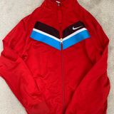 Nike red zip up jacket Photo 0