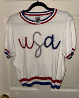 QUEEN OF SPARKLES White Short Sleeve Sweater with Red, Blue & Silver Trim Photo 0