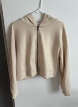 A New Day Zip up hoodie Photo 0
