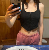 Black cropped corset top Loose threading at the bottom but no noticeable flaws Very soft fabric Shein size Small Photo 0