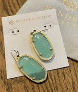 Kendra Scott earrings with light clear‎ turquoise oval stones and gold detailing Photo 0