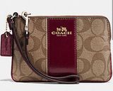 COACH Corner Zip Wristlet in Signature Khaki PVC and Sherry Leather RARE Color Photo 0