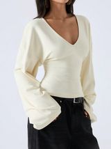 off-white V-neck lantern sleeve top Photo 0