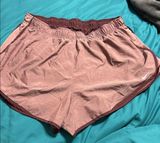 Nike Women's Dusty burgundy Athletic Shorts with Maroon Trim Photo 0