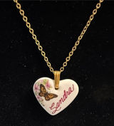 Source Unknown Gold-Tone Chain with White Heart Pendant and Butterfly Detail Photo 0
