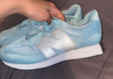 New Balance Women's Light Blue and Silver Sneakers Photo 0