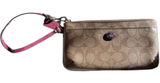 Coach Payton Signature C Go-Go Wristlet. Strap has some cracking. Original Tag Photo 0