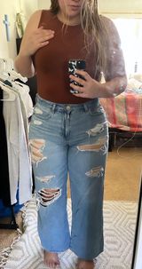 American Eagle High Waisted Ripped Mom Jean Photo 0