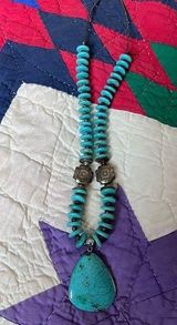 Beautiful necklace. Looks like turquoise and silver. I believe it is howlite. Photo 0