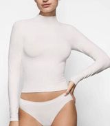 Soft Smoothing Turtleneck Top Photo 0