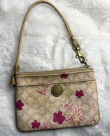 COACH Coated Canvas Signature Floral Wristlet Photo 0