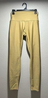 Alo 7/8 High Waist Airlift Legging, women’s size large in a gold/mustard color. Photo 0