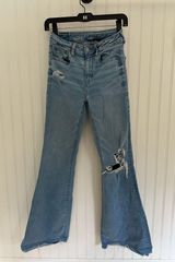 American Eagle Light Wash Flare Ripped Jeans Photo 0