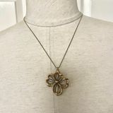 Avon vintage dogwood flower silver and gold tone pendant necklace Photo 0