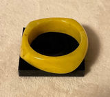 Yellow Resin Twist Bangle Bracelet Photo 0