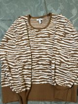 White and Tan Sweater Photo 0