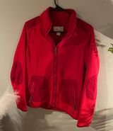 red fleece jacket Photo 0
